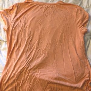 Orange short sleeve shirt
